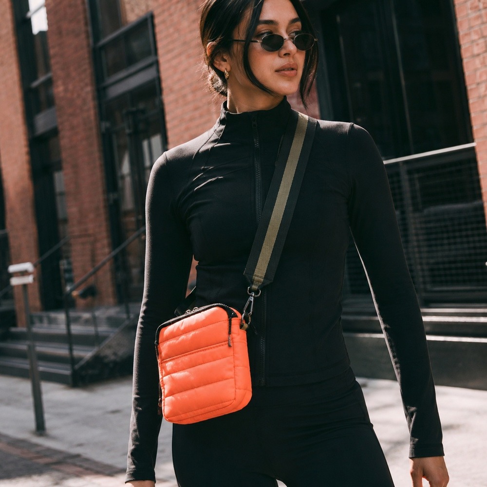 Think Royln The Cell Crossbody Bag Orange Reflective Quilted Puffer Phone Case